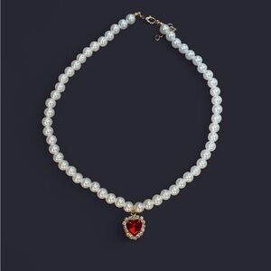 Aesthetic pearl choker with red heart diamond